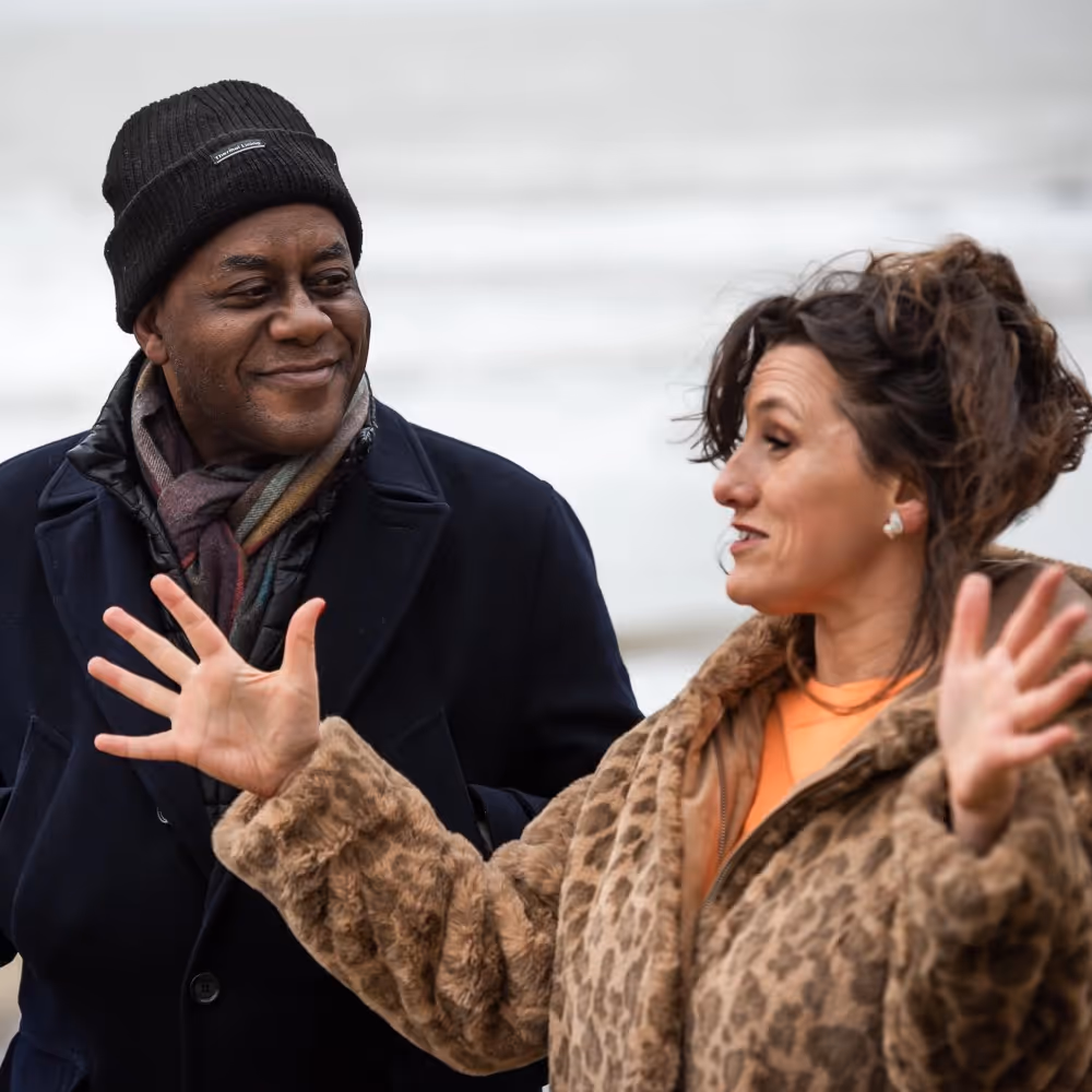 A man and woman talking