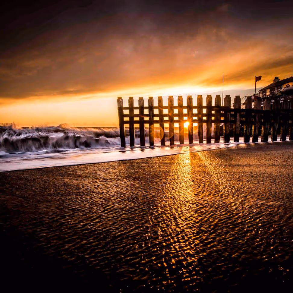 Beach groins at sunset