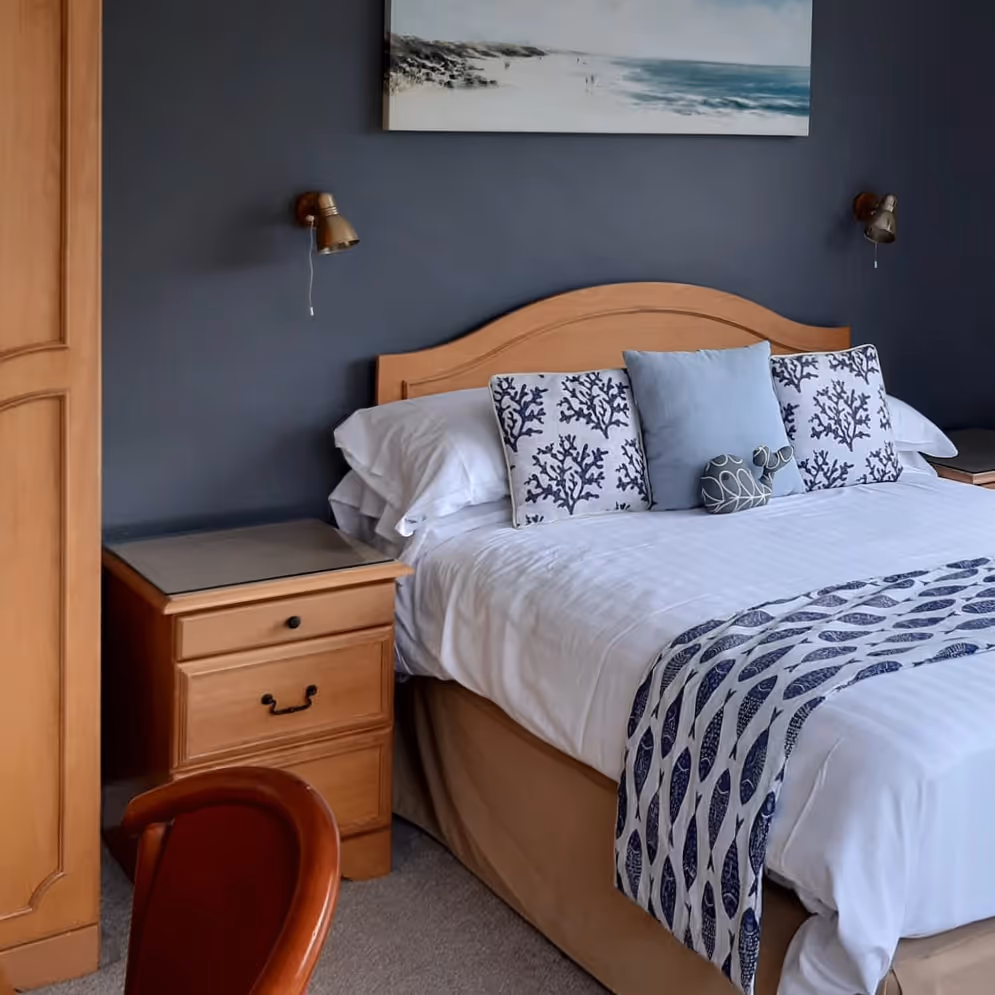 A hotel bedroom with modern decor