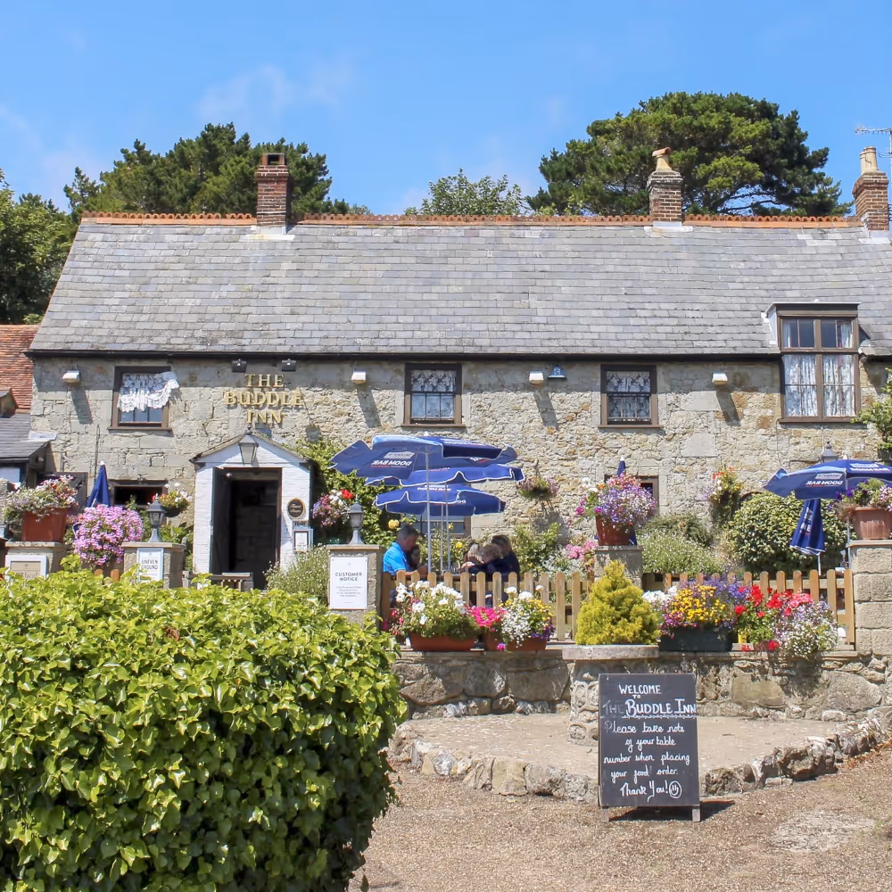 Exterior of an old stone pub