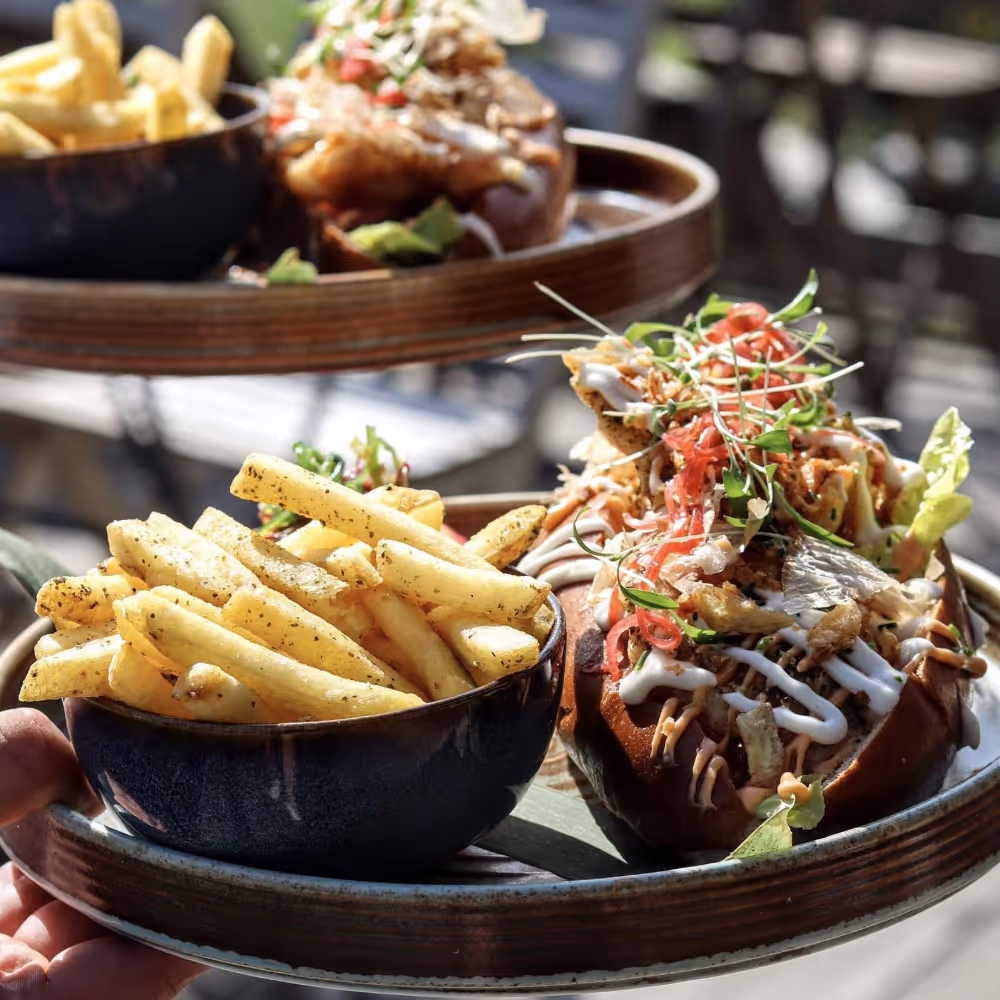 A loaded jacket potato with fries