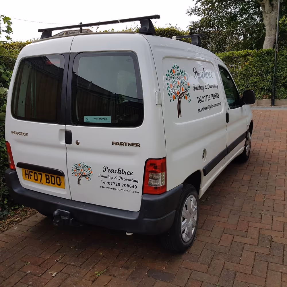 A small signwritten white van