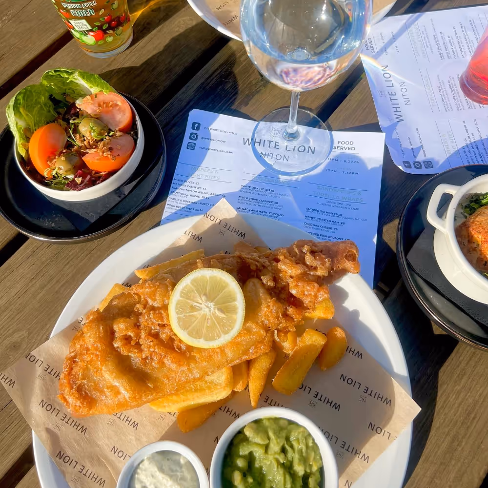 Fish and chips with mushy peas and a pint