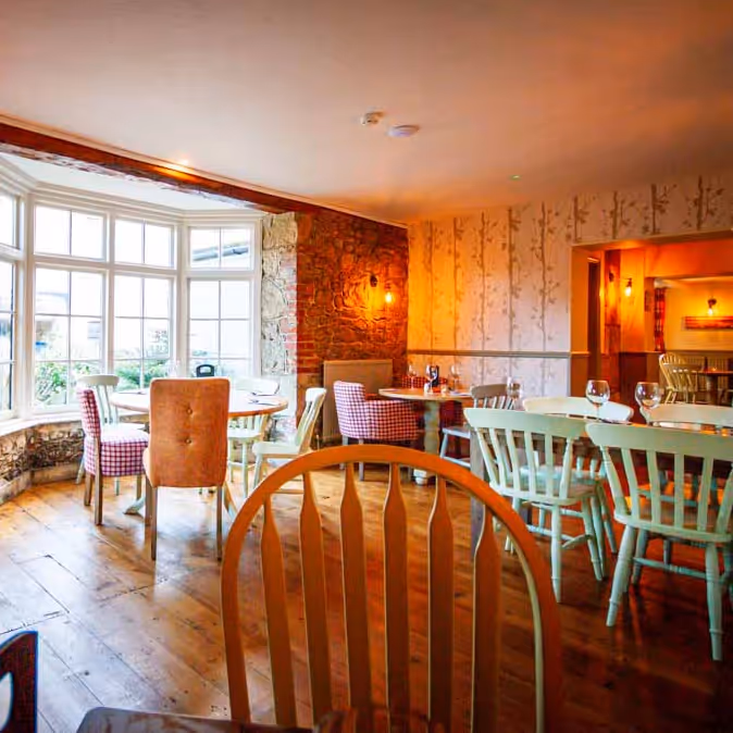 A pub dining area with a country cottage feel