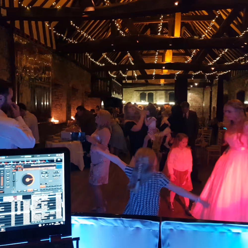 People dancing at a wedding disco