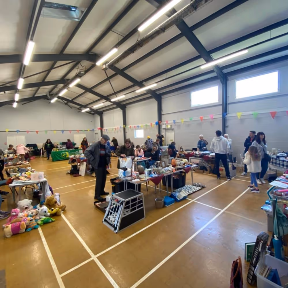 An indoor market at a community hall