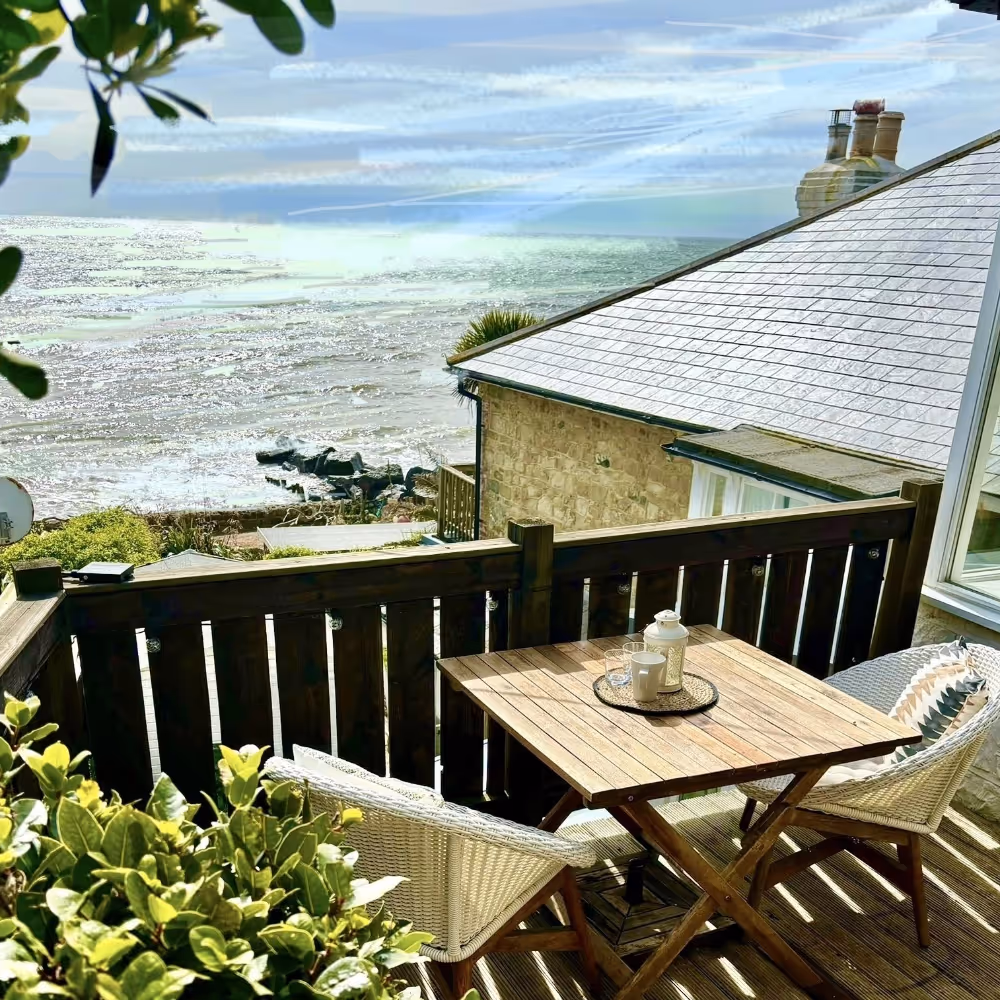 An elevated deck with a stunning sea view