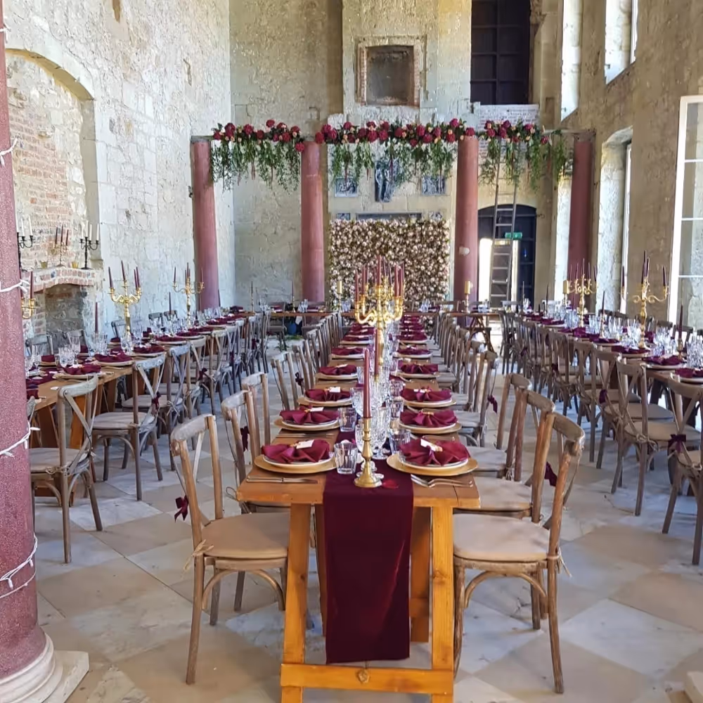 Interior of a ruined mansion set up for a wedding banquet