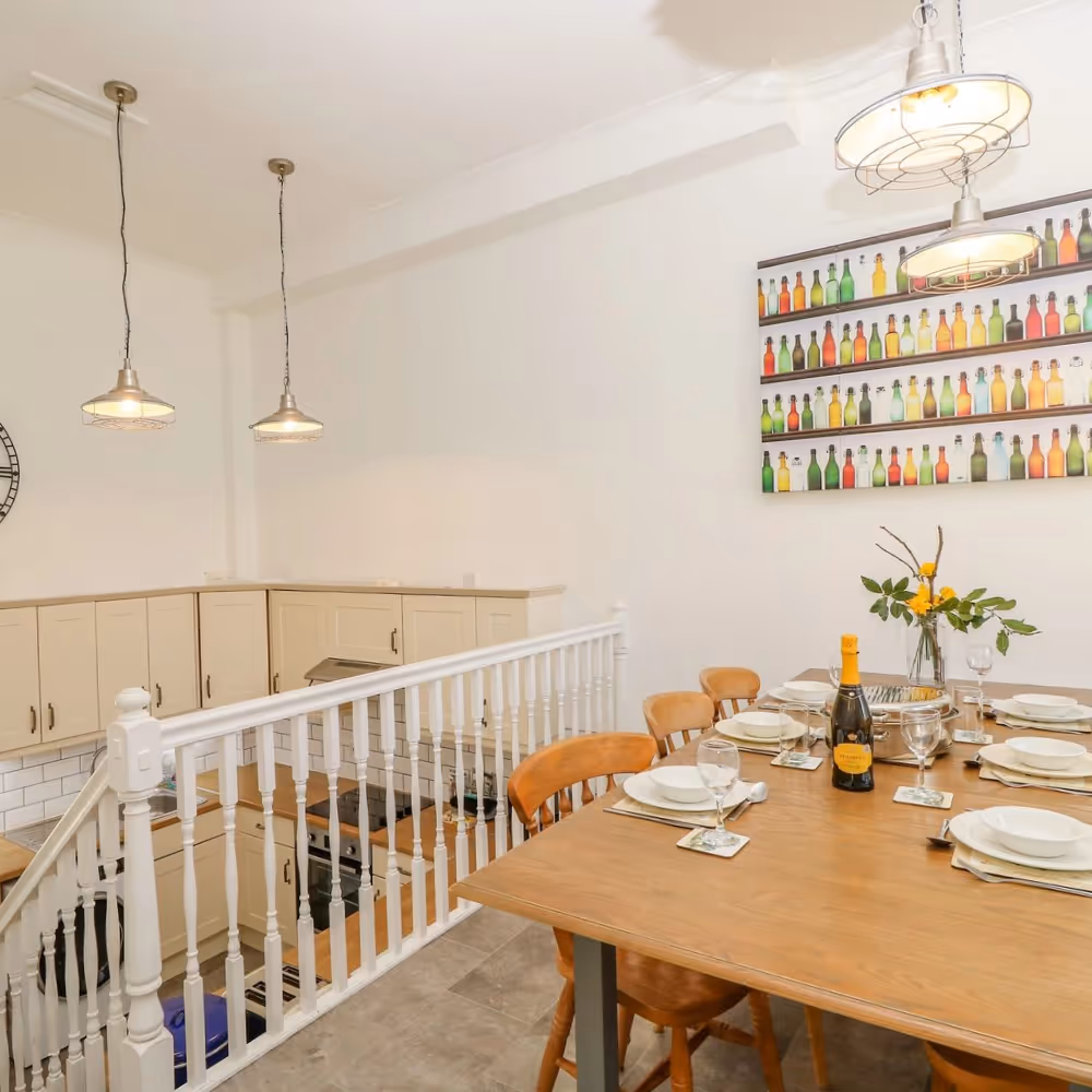 A kitchen with a mezzanine dining space