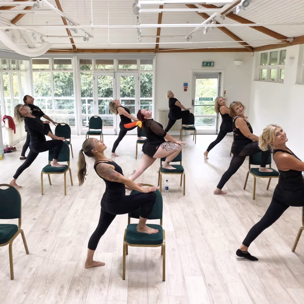 Women at a burlesque chair dance class