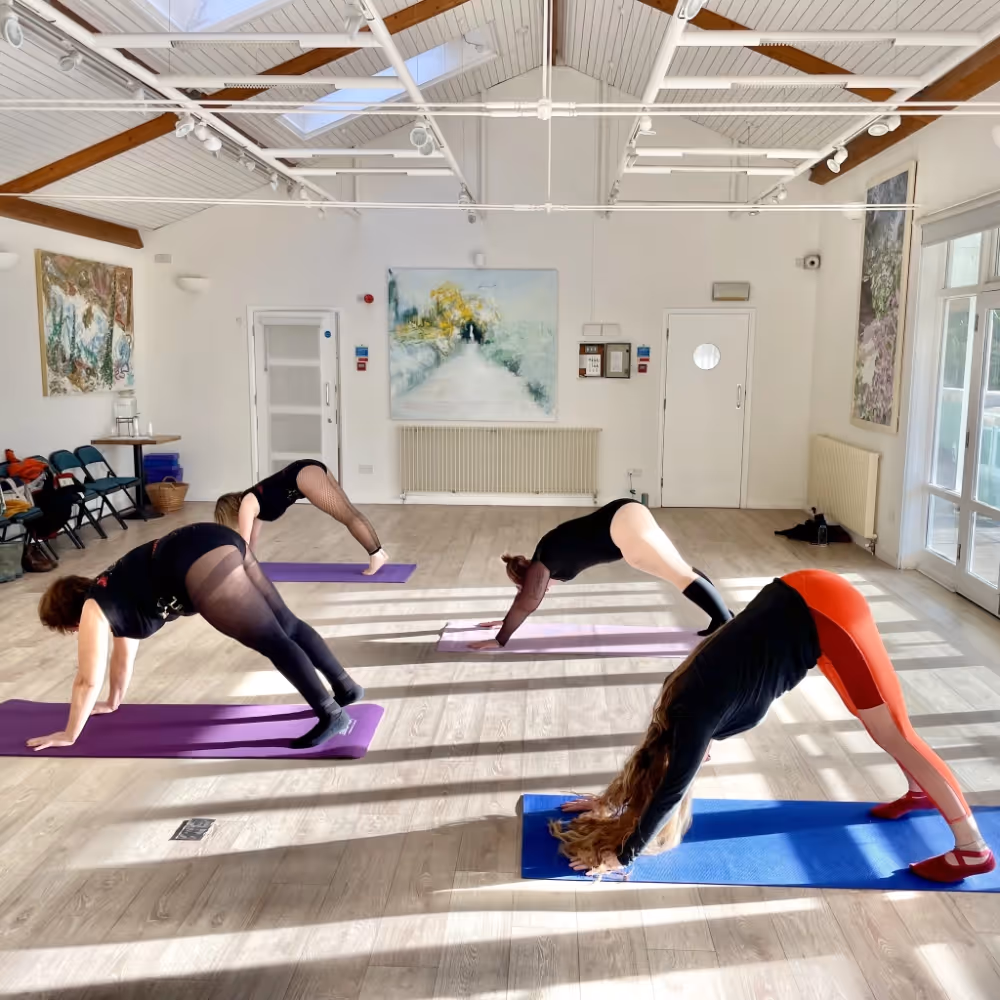 Women at a stretching class