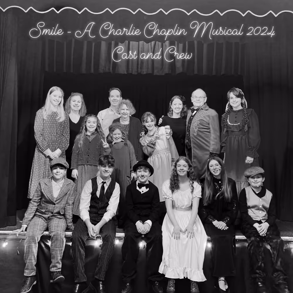 Young play actors on a stage