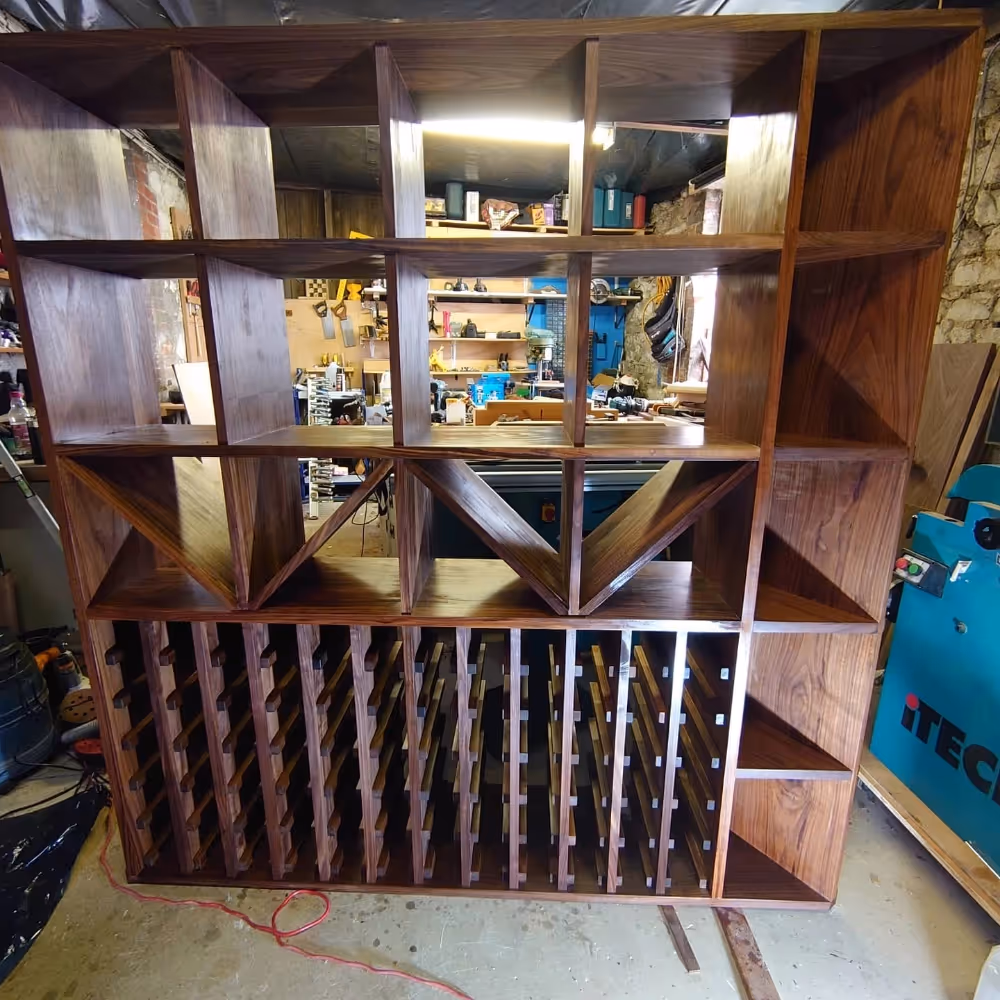 A walnut wine rack and shelf unit