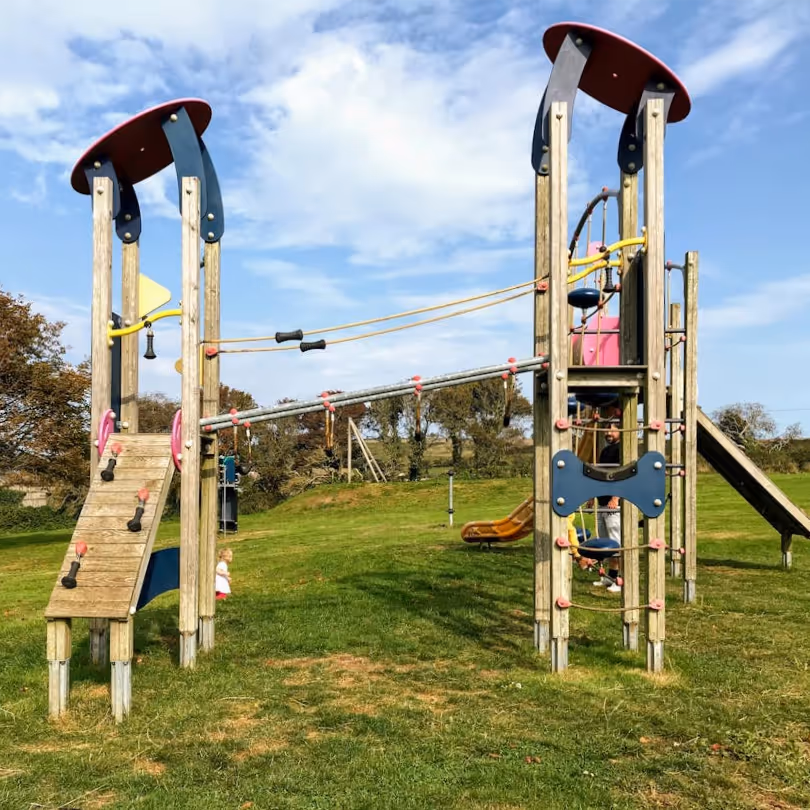 Wooden climbing frames in a kids playground