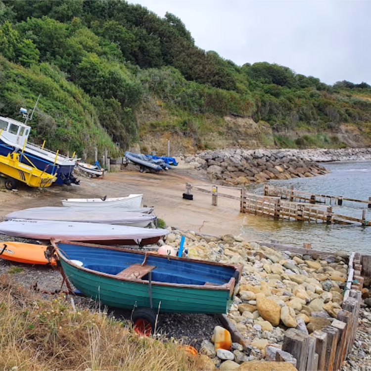 Fishing boats on the beach of a small cove