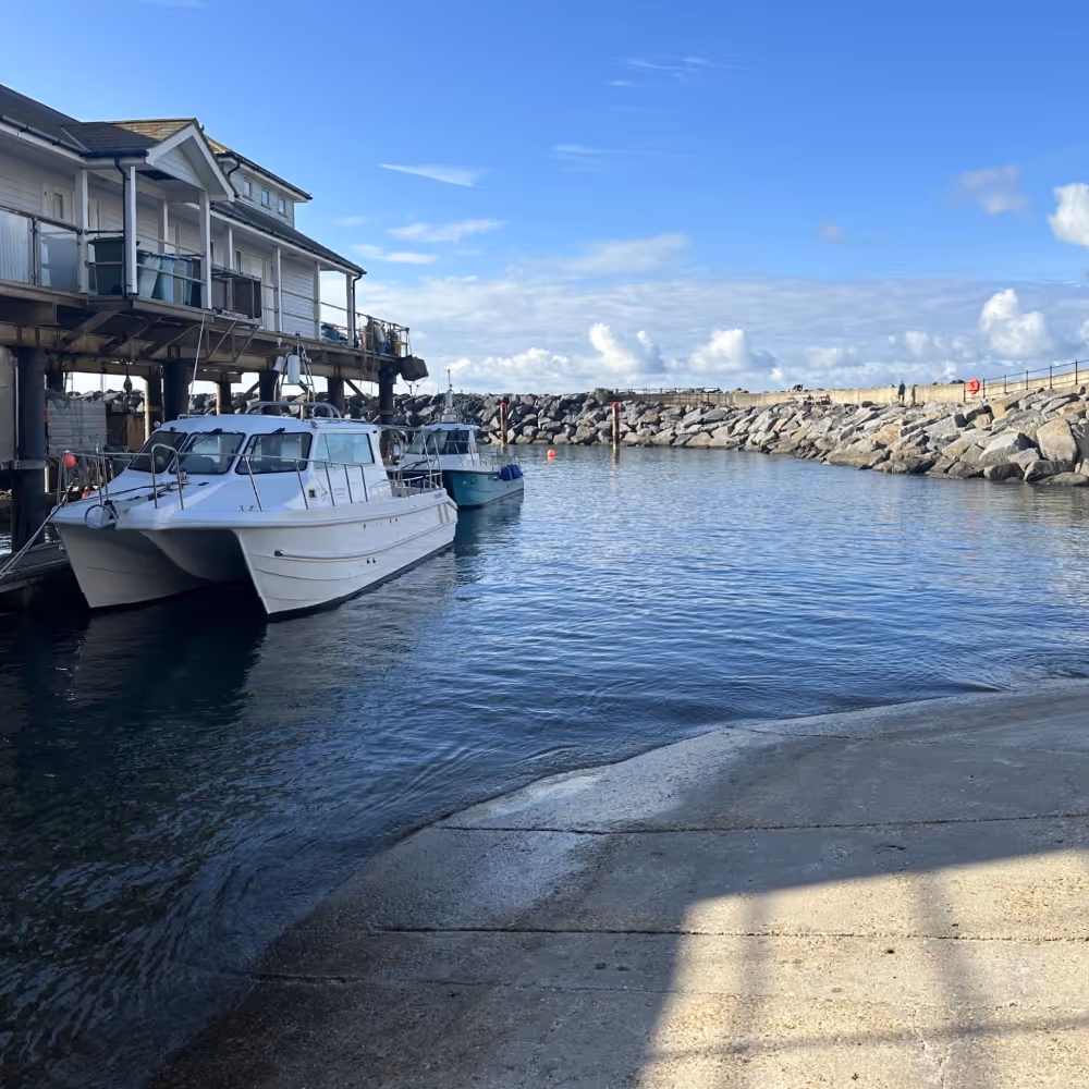 A boat moored in a small harbour