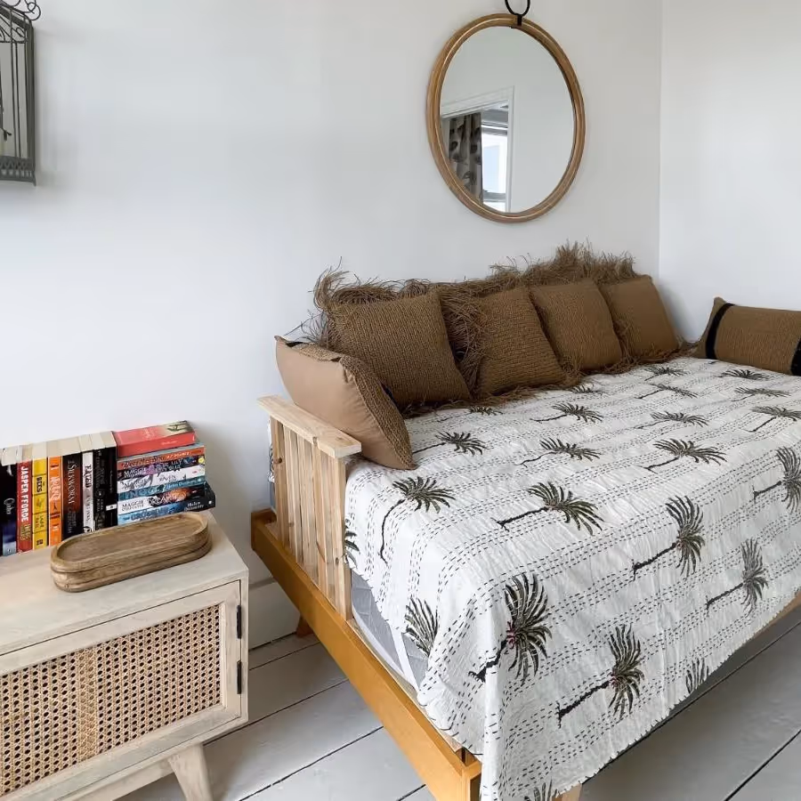 A living room with a sofa bed