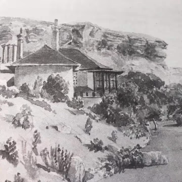 A black and white photo of a watercolour painting depicting and old house