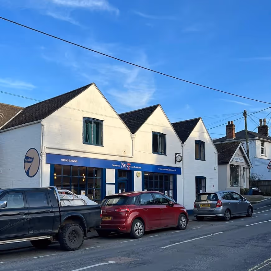 Exterior of a pub with a post office inside