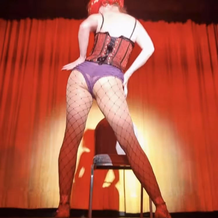 A woman performing burlesque