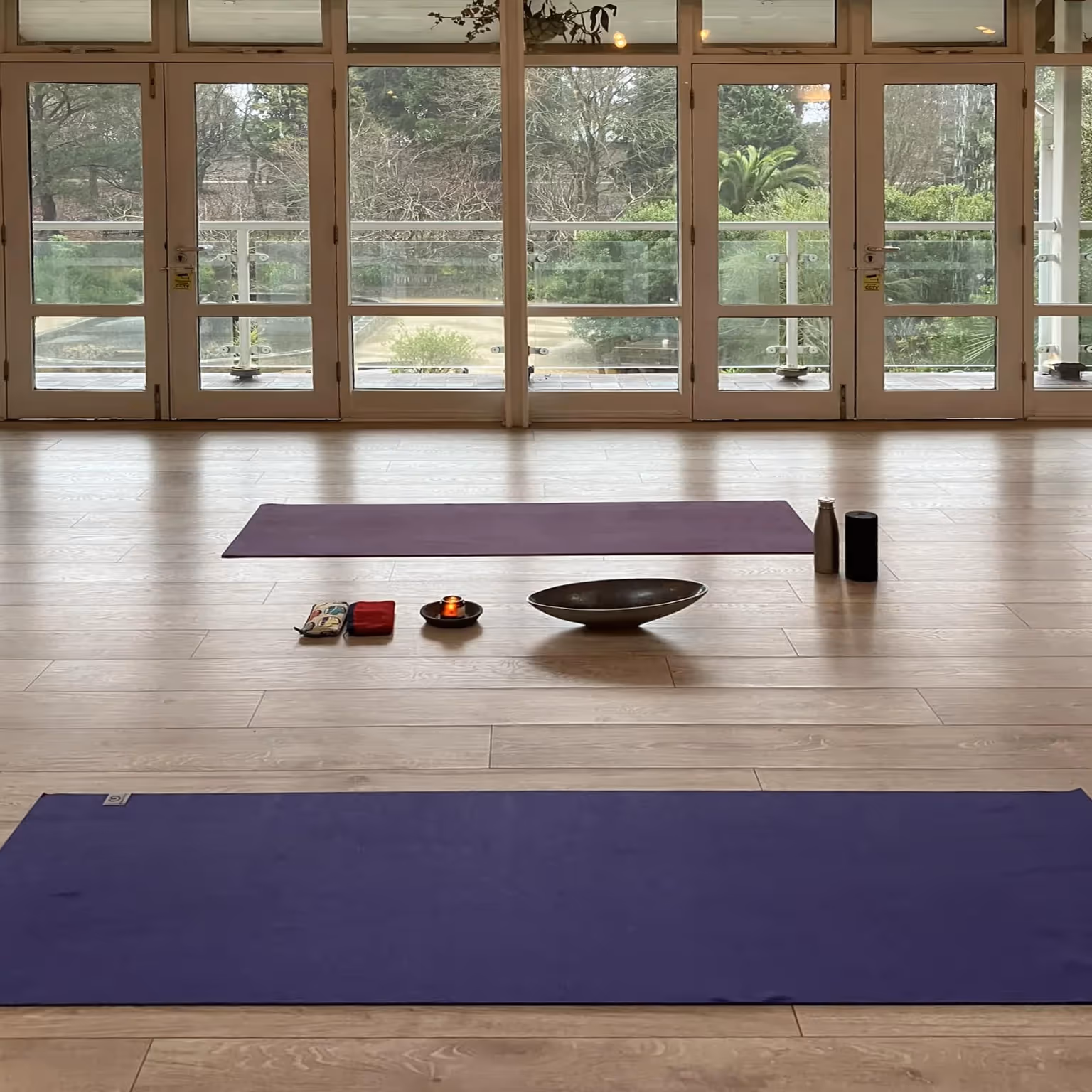 A yoga mat set up ready for a class