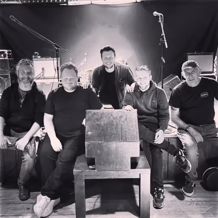 Black and white photo of a band