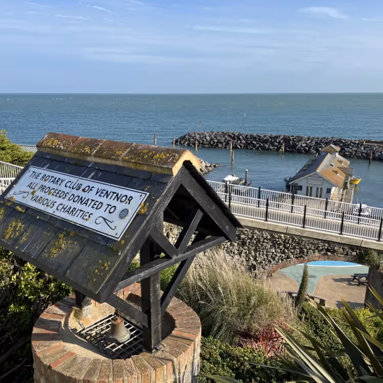 A charity donation well overlooking a bay