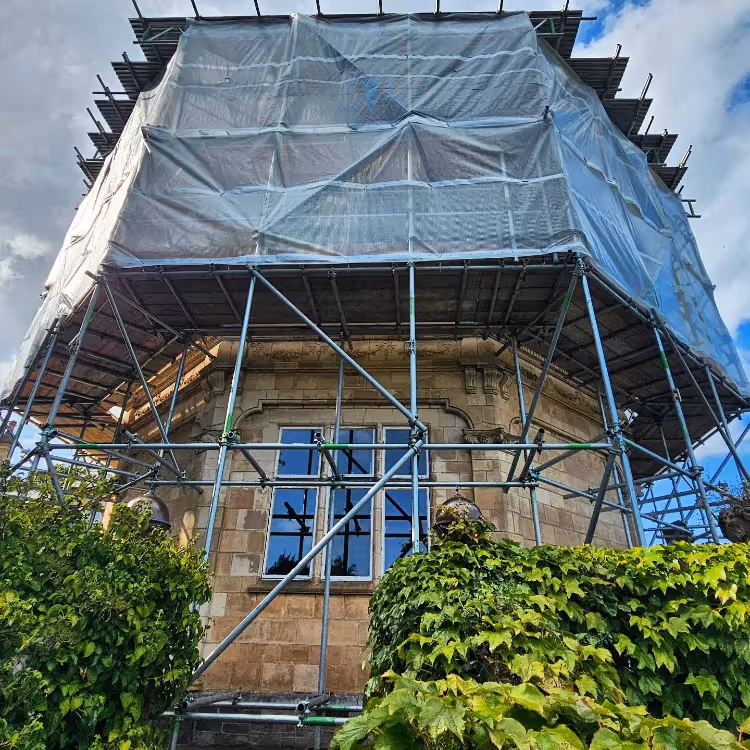 Scaffolding around a bay window