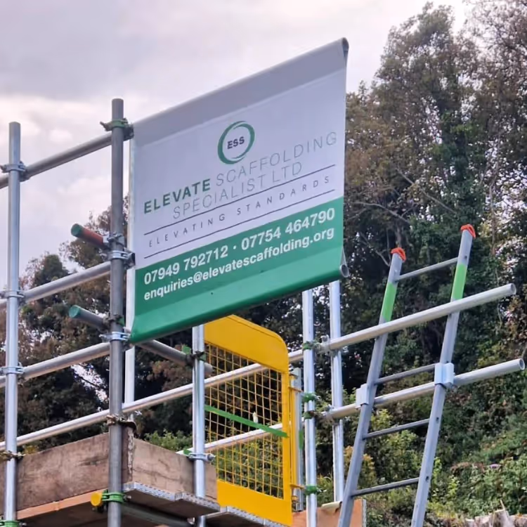 Scaffolding and company sign