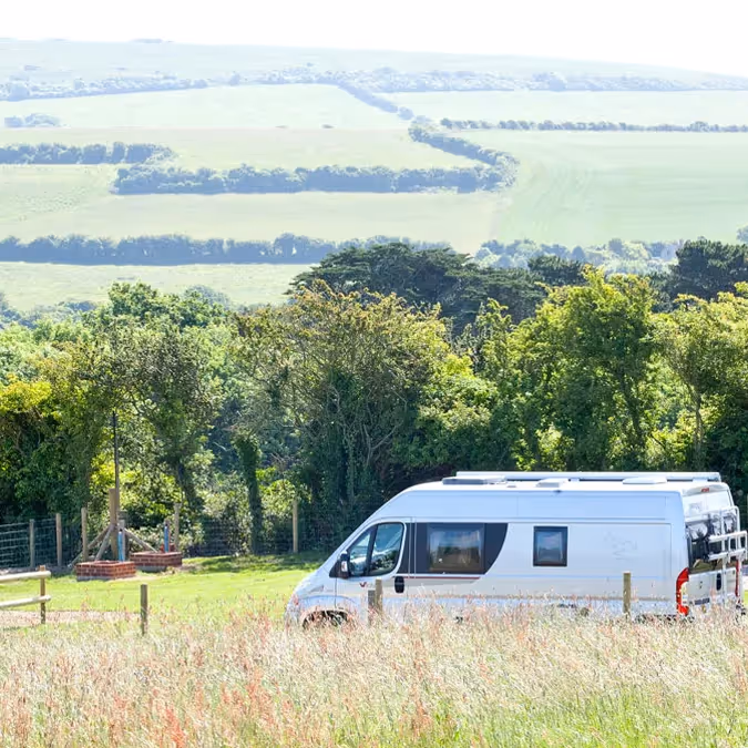 A campervan in a rural campsite