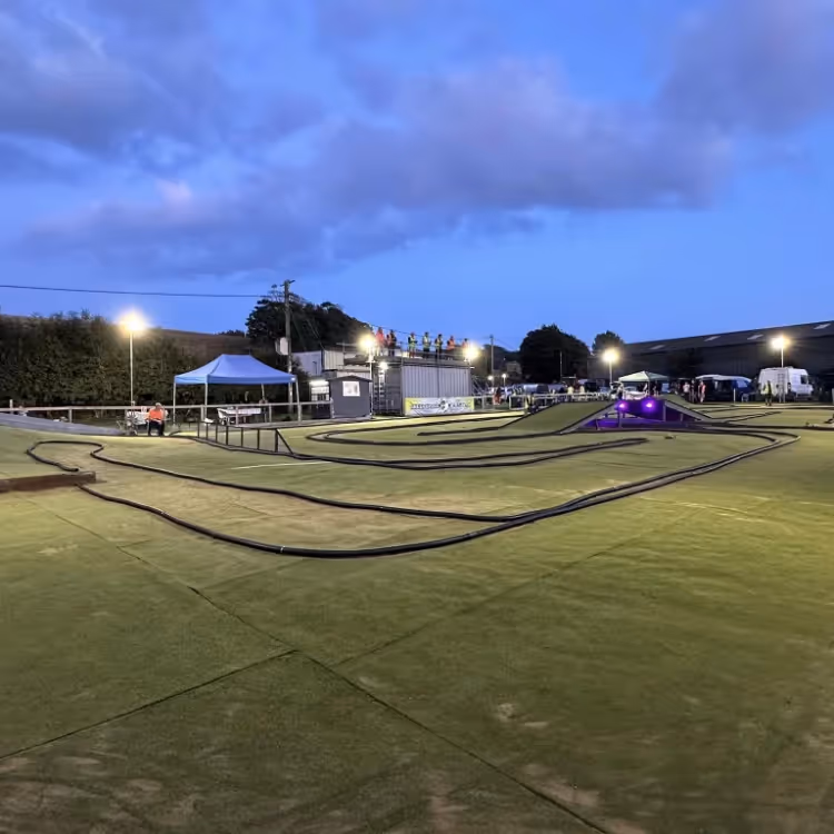 A remote control car racetrack lit at night