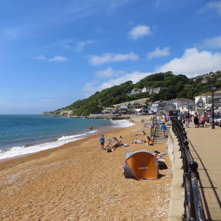 A shingle beach on a sunny day