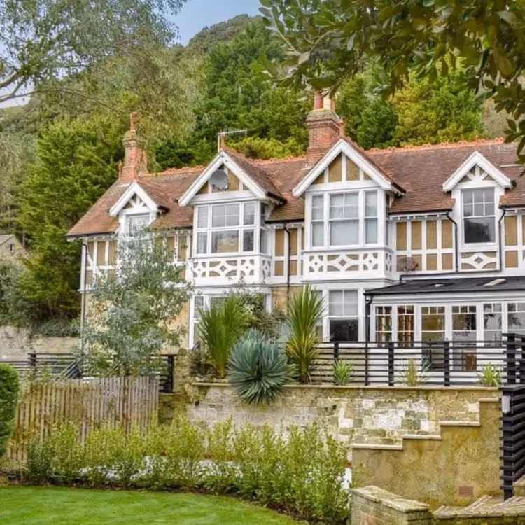 A lovely house with a red tiled roof