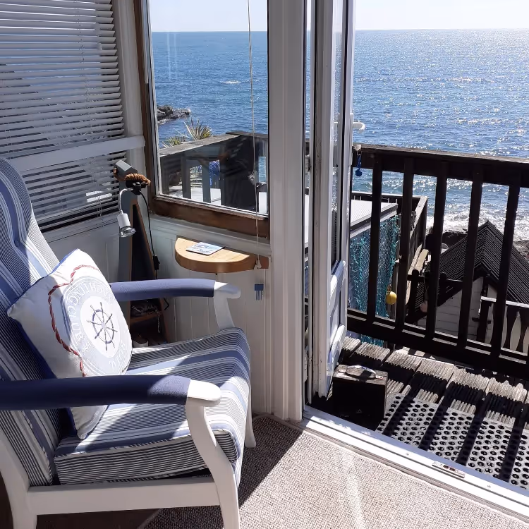 A balcony overlooking the sea