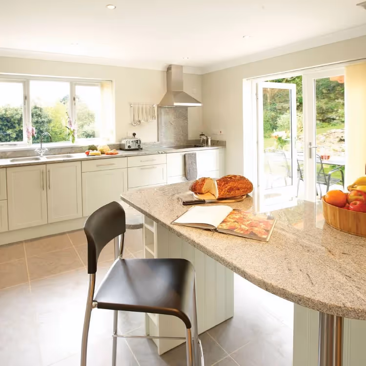 A white kitchen with breakfast bar