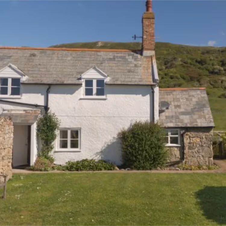 A white washed coastal cottage