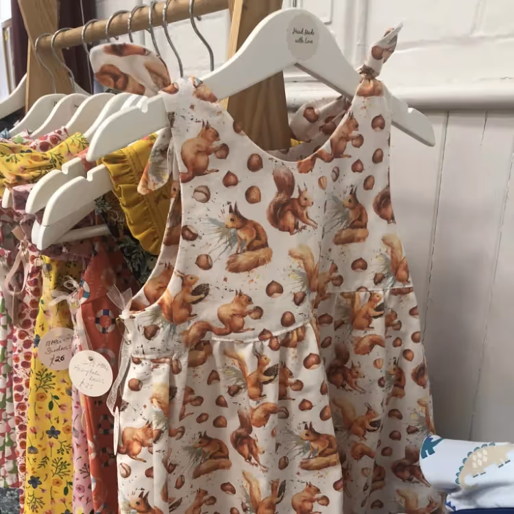 A selection of handmade baby dresses