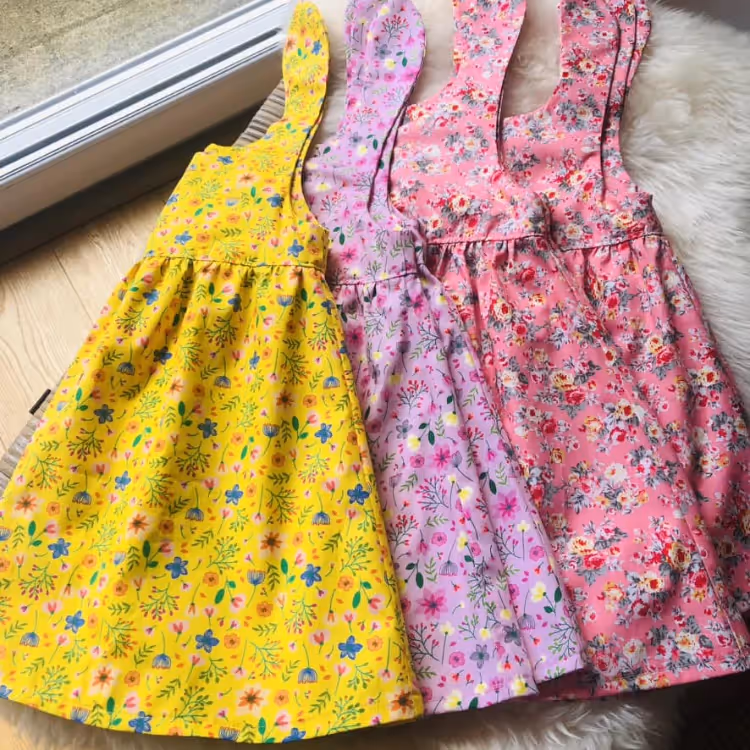 Three toddler's dresses