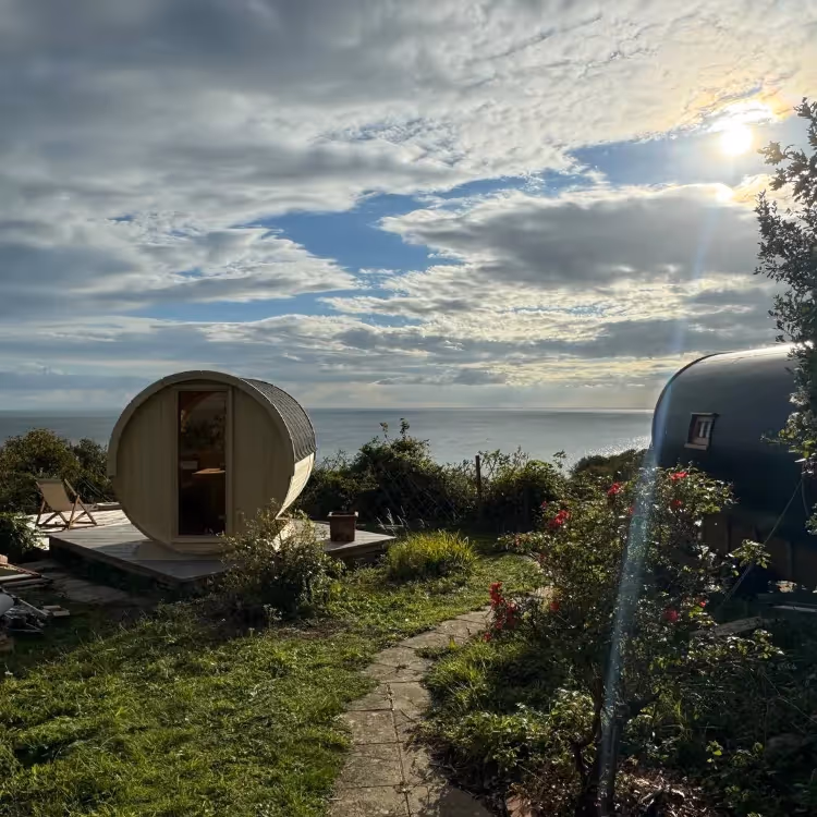 A glamping shepherds hut overlooking the sea