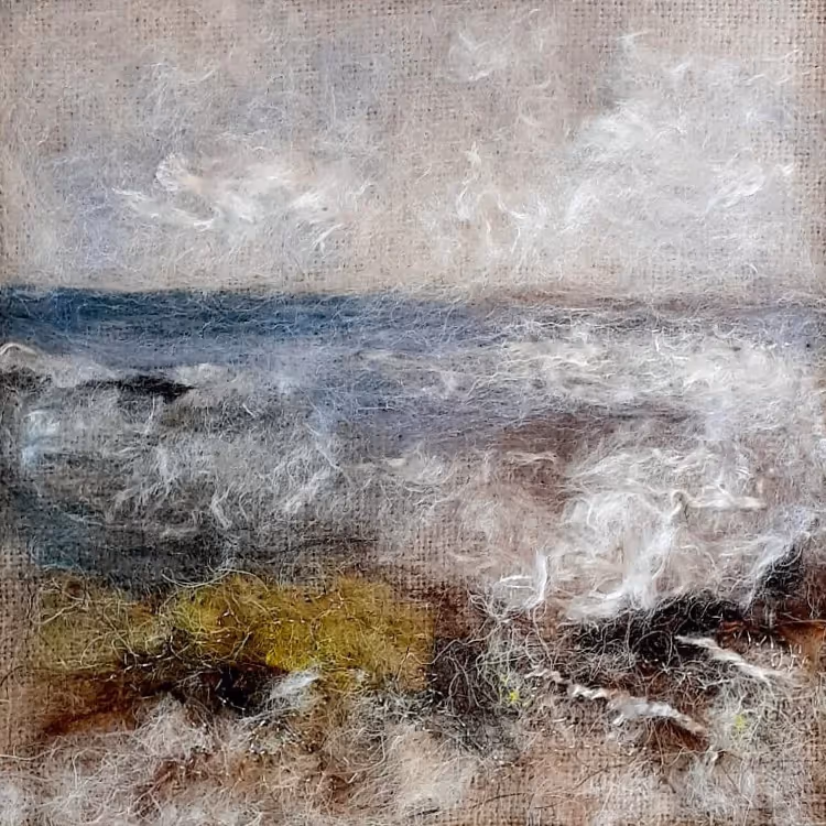 A seascape picture made from felt