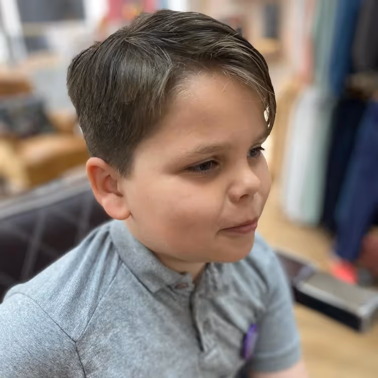 A boy in a hair salon