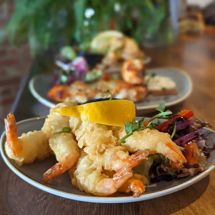 A tapas dish of battered prawns
