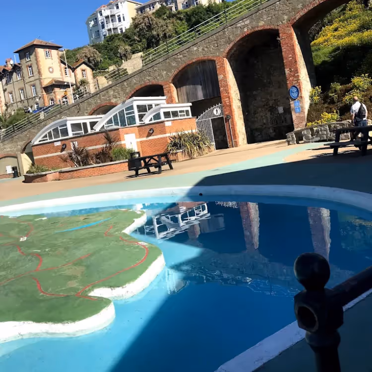 An open air paddling pool by the sea