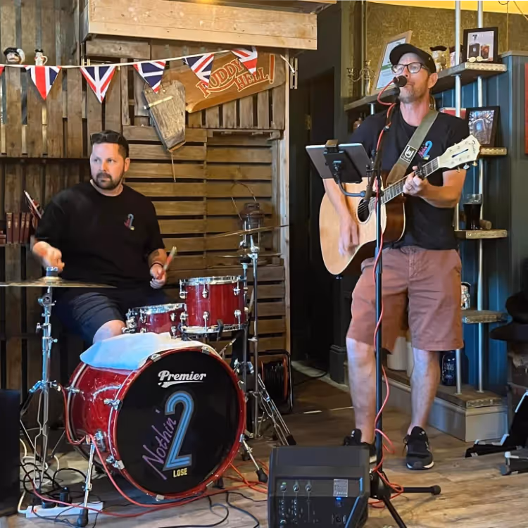 Two musicians performing