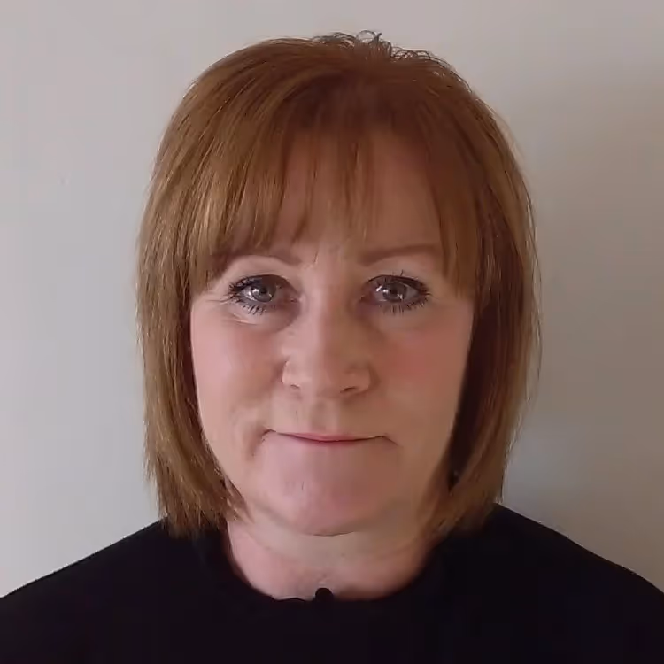 A lady with a short bob hairstyle