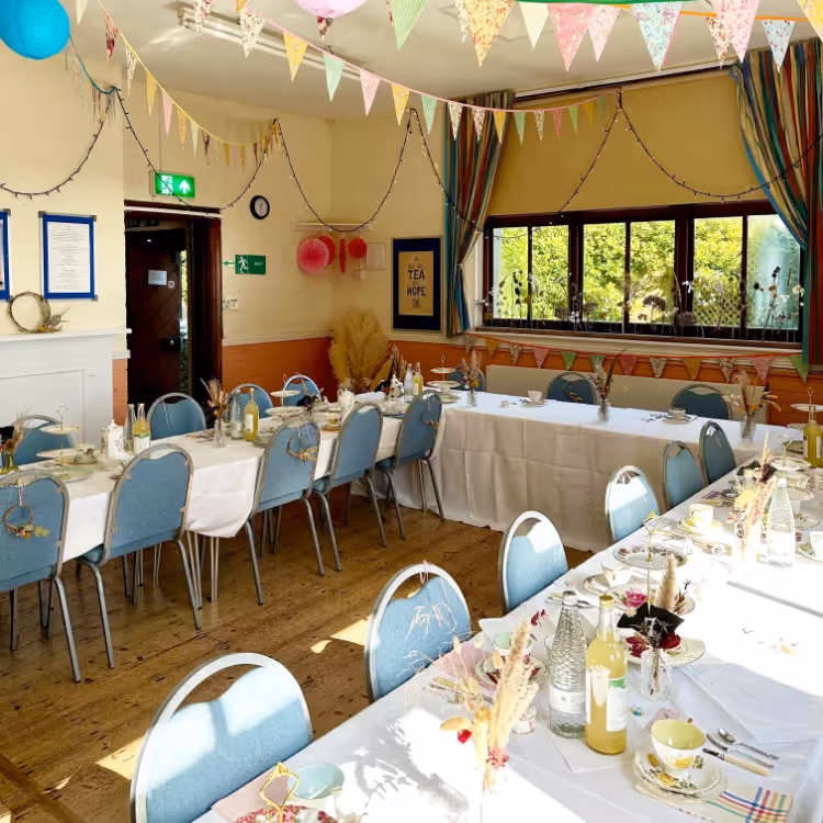 A village hall set up ready for a wedding