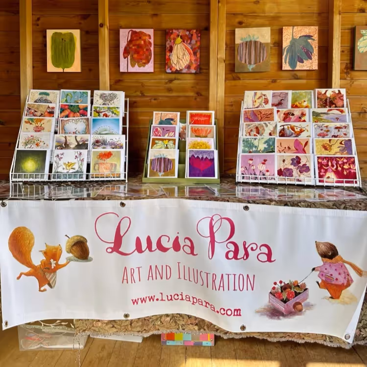 An artist's greetings cards for sale at a craft market