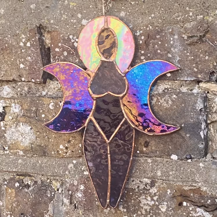 An irridescent stained glass angel.