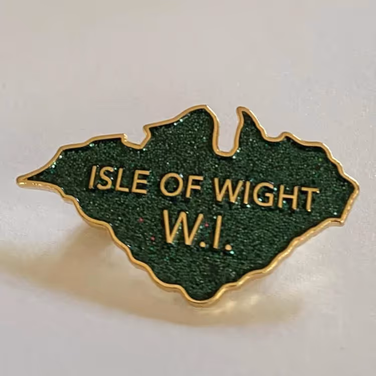 A brooch in the shape of the Isle of Wight
