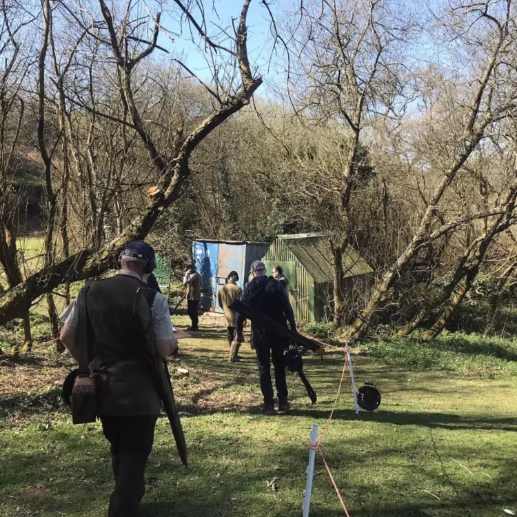 Men with guns at a clay pigeon shoot